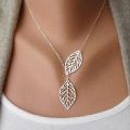 Creative Simple Double Gold Leaf Pendant Necklace Women's Trend Punk Tassel Chain Pendant Fashion Ladies Party Jewelry Gifts. 
