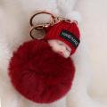 cute keychain baby doll fluffy keychain feather fluff baby doll cute keyhains for gift by Ataya. 