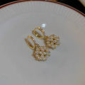 Hong Kong style pearl zircon earrings are versatile, personalized, exquisite, and high-end for women. 