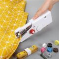 Discover the Convenience of our Mini Sewing Machine – Your Portable Handy Stitch Companion for Effortless Sewing! Transform your sewing experience with this easy-to-use and stylish Silai Machine. Elevate your creativity with portable perfection!. 
