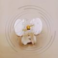 A Pack of 4 Korean Style High-Quality Mini Hair Catchers in White - Stylish Hair Accessories for Taming Stray Hairs. 