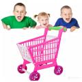 Toy shopping cart with baby toys. 
