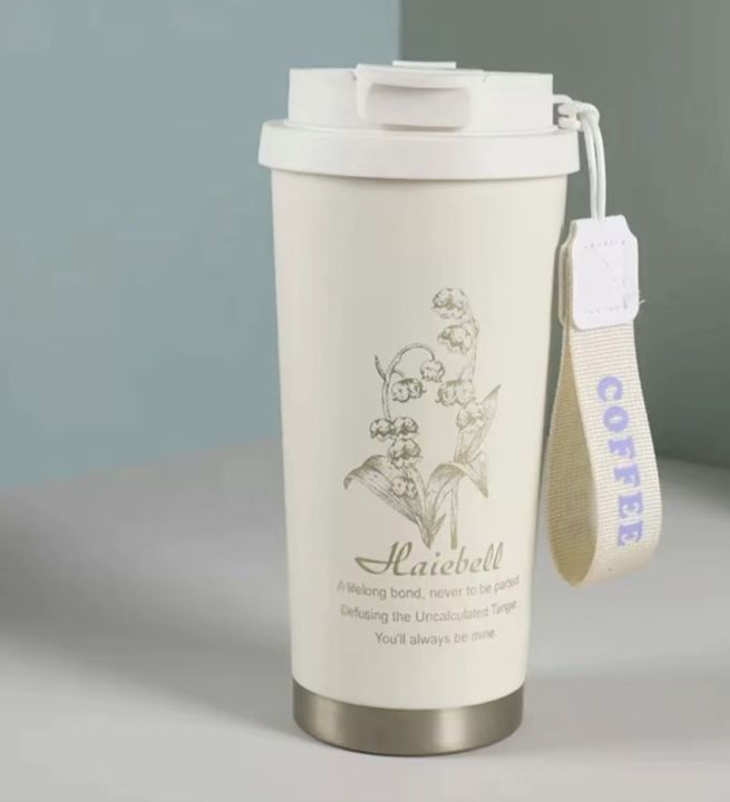 Harebell%20Premium%20Travel%20Coffee%20Mug%20%7C%20Double%20Wall%20Stainless%20Steel%20Vacuum%20Insulated%20Tumbler%20with%20Leak-Proof%20Flip%20Lid%20&%20Carry%20Strap%20%E2%80%93%20Elegant%20White%20Gold%20Floral%20Design%20%7C%20Reusable%20Hot%20&%20Cold%20Beverage%20Cup%20for%20Office,%20Home%20&%20Outdoor%20Use%20%E2%80%93%20500ml%20-%20Image%203