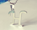 Stylish Silver And Black Alphabet H Locket. 