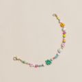 Small beaded bracelet in flower petal design. 