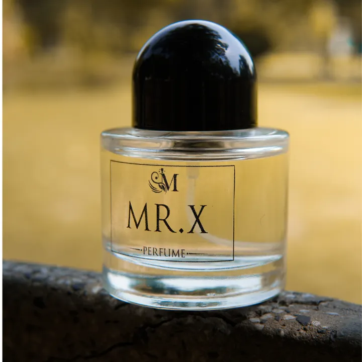 Muxaroma%20MR.X%2050ml%20Perfume%20%E2%80%93%20A%20Mysterious%20and%20Bold%20Fragrance%20for%20the%20Confident%20Individual.%20A%20captivating%20scent%20designed%20for%20those%20who%20thrive%20on%20intrigue%20and%20charisma.%20This%20bold%20and%20alluring%20fragrance%20blends%20fresh,%20spicy,%20and%20woody%20notes.%20-%20Image%205