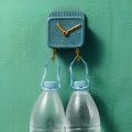 Wall-Mounted Multifunctional Clock Design Mobile Holder. 