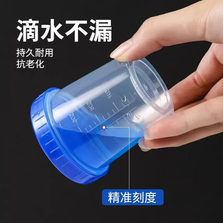 Plastic%20Small%20Measuring%20Cup%20with%20Graduated%20ml%20Household%20Baby%20Small%20Measuring%20Cup%20with%20Lid%20Container%205ml10ml50ml100%20-%20Image%204