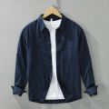 Men;s long sleeves navy blue shirt with under white T Shirt. 