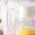 Glass Pitcher 1.1 Liter Jug with Lid Enjoy your favorite beverages featuring a practical lid for easy pouring and storage. Perfect for water, juice, or iced tea, this durable pitcher is an excellent addition to any kitchen. 