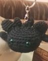 Keychains of Light Fury and Toothless. 