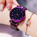 stylish magnet wrist watch for women in golden and purple color THRILL. 
