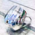 Stainless steel mug. 
