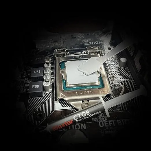 Maxtor%20CTG8%202%20Grams%20Thermal%20Compound%20Paste%20Heat%20Sink%20for%20IC/Processor/CPU/GPU/All%20Coolers,%2012.8W/m.k%20Carbon%20Based%20High%20Performance,%20Thermal%20Interface%20Material%20-%20Image%206