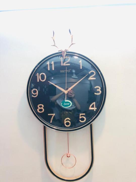 ELEGANT BEAUTIFUL DESIGN CLOCK WITH SCREW HORN GOAT STRUCTURE IN TOP AND PENDULUM FANCY AND ATTRACTIVE WALL CLOCK STYLISH DESIGN SMOOTH MACHINE WALL CLOCK HANGING WALL CLOCK HOME DECORATION PERFECT FOR GIFT