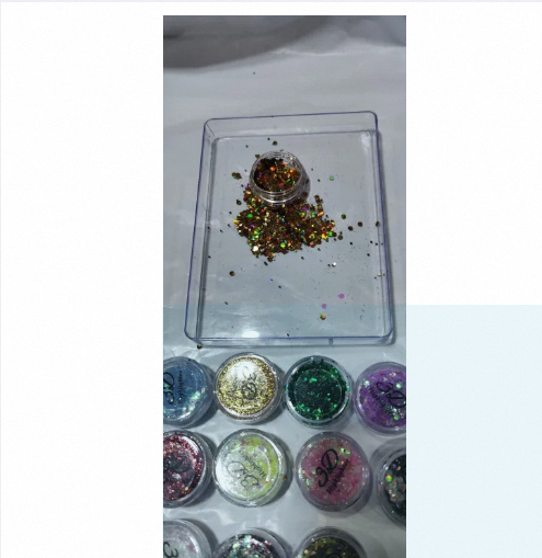 Pack%20of%2012%20Glitter%20Eyeshadow%20Dust%20with%20Eye%20Sealer%20Deal%20%7C%20Loose%20Pigment%20Shimmer%20Makeup%20Kit%20for%20Eyes,%20Face%20&%20Body%20%7C%20Long-Lasting%20Sparkle%20&%20Waterproof%20Glitter%20Glue%20-%20Image%204