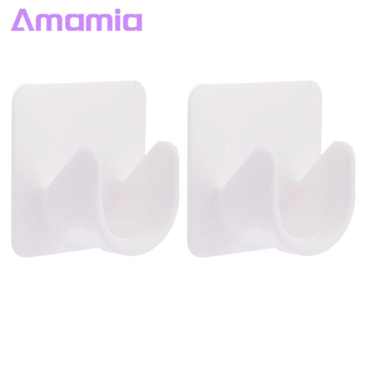 Semi-circular retaining grooves prevent shifting and bond securely to most common surfaces, preventing your shower curtain rod from sliding.