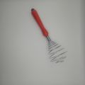 egg mixer- stainless steel egg mixer with plastic handle. 