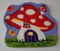 Whimsical Mushroom Cottage measuring 43 x 38 cm punch needle wall hanging. 