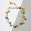 Small beaded bracelet in flower petal design. 
