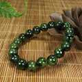 chengli Yaowang stone natural active magnetic single circle bracelet serpentine Tibetan jade olive green meteorite graphite green jade bracelet. 