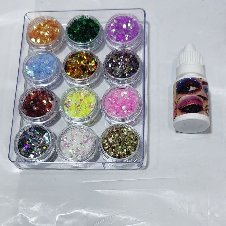 Pack%20of%2012%20Glitter%20Eyeshadow%20Dust%20with%20Eye%20Sealer%20Deal%20%7C%20Loose%20Pigment%20Shimmer%20Makeup%20Kit%20for%20Eyes,%20Face%20&%20Body%20%7C%20Long-Lasting%20Sparkle%20&%20Waterproof%20Glitter%20Glue%20-%20Image%202