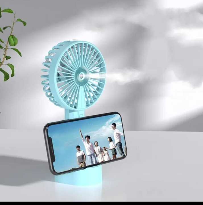 Mini%20Portable%20Handheld%20Cooling%20Fan,%20Water%20Mist%20Spray%20Cooler,%20USB%20Rechargeable%20Cooling%20Fan,%206%20hours%20Long%20Battery%20Time%20with%20Mobile%20stand%20option,%20120mAH.%20-%20Image%204