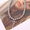 Goth Harajuku Cute Y2K Aesthetic Bowknot Pendant Grey Pearl Beaded Rope Chain Necklace for Girl Choker Cool 90s EMO Accessories. 