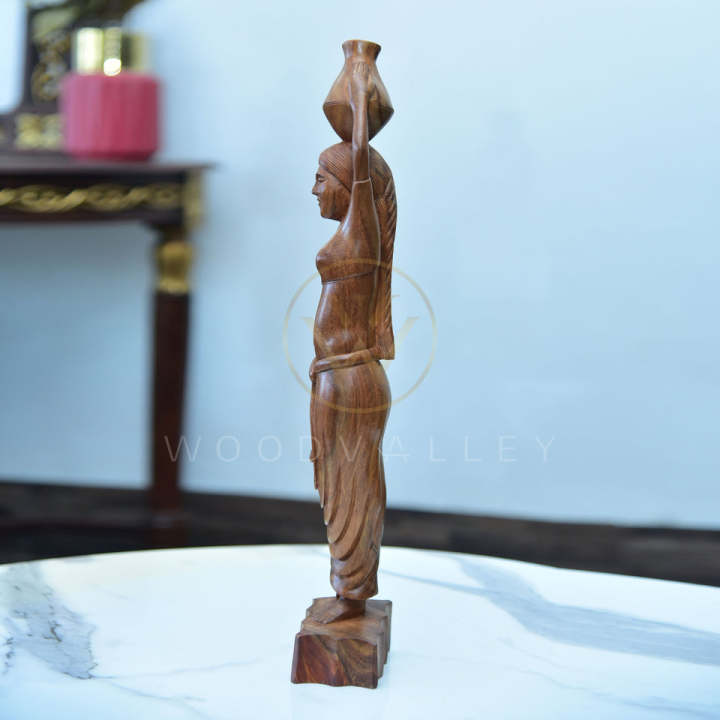 Wooden%20Hand%20Carved%20Native%20Women%20Cultural%20Sculpture-Wooden%20Woman%20Figurine%20Statue%20Hand%20Carved%20Tribal%20Art%20Sculpture-Folk%20Art%20Teak%20Wood%20Sculpture%20Hand%20Carved%20Native%20Woman%20Carrying%20Water%20-%20Image%203