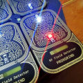 Tiny portable dual-frequency RFID field detector by Proxgrind Muqin. 