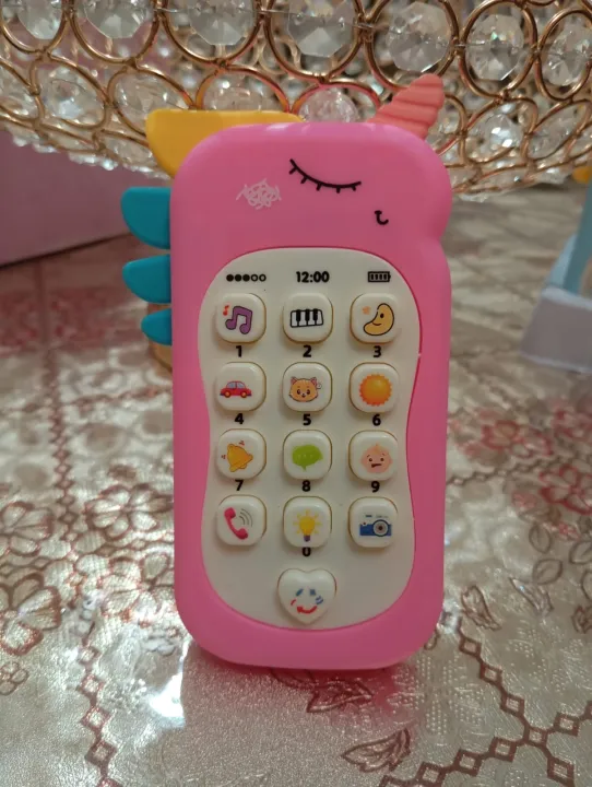 Baby%20Phone%20Toy%20%E2%80%93%20Musical%20Sound%20Telephone%20with%20Teether%20&%20Lights%20%7C%20Interactive%20Educational%20Toy%20for%20Infants%20&%20Toddlers%20%7C%20Perfect%20Gift%20for%20Kids%20-%20Image%209