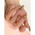 Golden nail polish. 