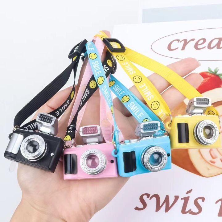 Head dog smiley strap webbing luminous sound camera pendant simulation doll mini camera backpack