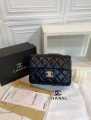 Chanel Black Quilted Lambskin Mini bag. 