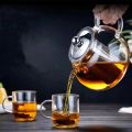 Premium Glass Tea Kettle - Borosilicate Glass with Stainless Steel Strainer, Heat Resistant Teapot, Microwave and Stove Safe Tea pot - 950ml - 1300ml. 