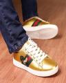 Stylish Golden Lifestyle Fashion Sneakers. 
