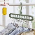 5PCS-Pack - Super Magic Changeable Clothes Pluto Space Saving Saver Wonder Closet Organizer 9 Holes Holder Cloths and Pants Plastic Hanger. 