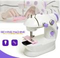 Mini Electric Sewing Machine. 