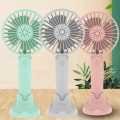Portable electric rechargeable handy cooling fan with rechargeable cell. 