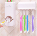 Automatic toothpaste dispenser with tooth brush holder, plastic automatic tooth paste dispenser set wall mounted. 