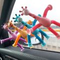 Telescopic Giraffe Suction Cup Toy, Cute Giraffe Stretch Tube Stress Relief Sensory Toy  in Four Different Colors Suction Cup Giraffe Pop Tube Sensor Fidget Toy For Kids, Deformable  Sensory Suction Cup Plastic Toy, Suction Robot Toy Funny Toy. 