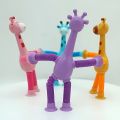 Telescopic Giraffe Suction Cup Toy, Cute Giraffe Stretch Tube Stress Relief Sensory Toy  in Four Different Colors Suction Cup Giraffe Pop Tube Sensor Fidget Toy For Kids, Deformable  Sensory Suction Cup Plastic Toy, Suction Robot Toy Funny Toy. 