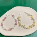 Small beaded bracelet in flower petal design. 
