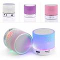 Mini Portable Bluetooth & Rechargeable Speaker with Light + SD Card + FM Radio + USB Supported Multi Color. 