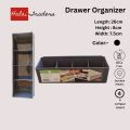 Drawer Organizer – Durable Plastic Storage Box with 4 Compartments for Kitchen, Closet, Office, or Bathroom – Space-saving Partition Divider for Drawers – Compact Multi-purpose Organizer for Makeup, Stationery, and space saver – 26.2 x 9 x 7.5 cm. 