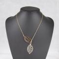 Creative Simple Double Gold Leaf Pendant Necklace Women's Trend Punk Tassel Chain Pendant Fashion Ladies Party Jewelry Gifts. 