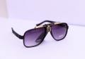 Stylish Black Plastic Frame Sunglasses Featuring Gold Accents, Gradient Shades, and Includes Free Gift Box original pics also in gallery. 