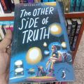 The Other Side of Truth by Beverley Naidoo. 