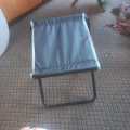 Folding stool in cloth.. 