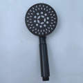 A minimalist bathroom with five adjustable a handheld showerhead set, showerheads, and shower heads. 
